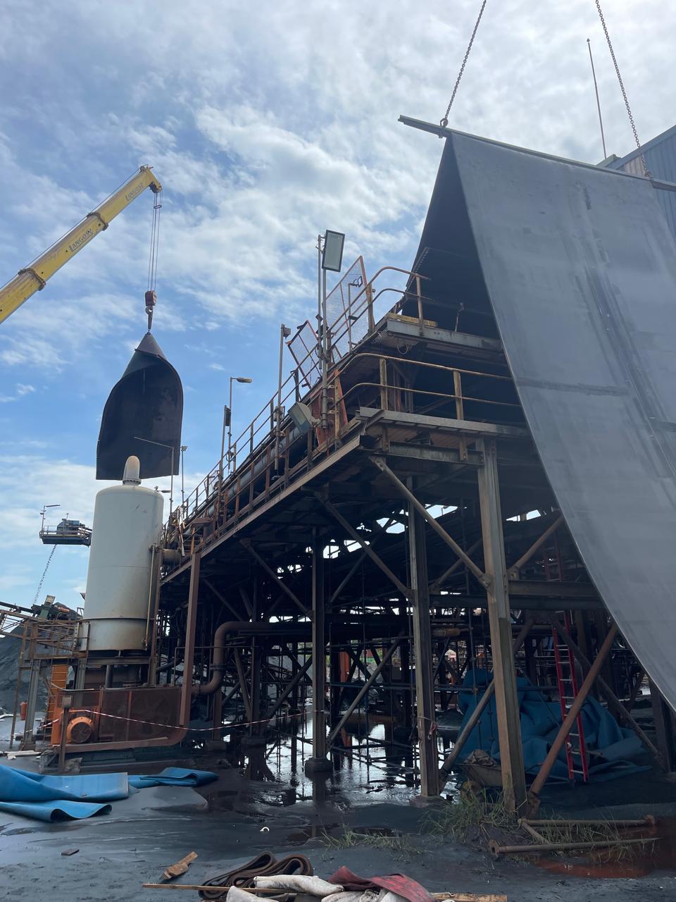 Industrial conveyor site supporting bulk material handling operations
