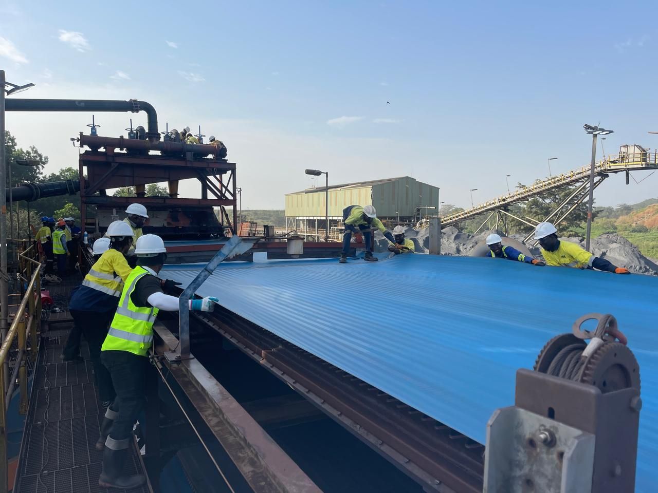 Industrial conveyor structure used for bulk material handling operations